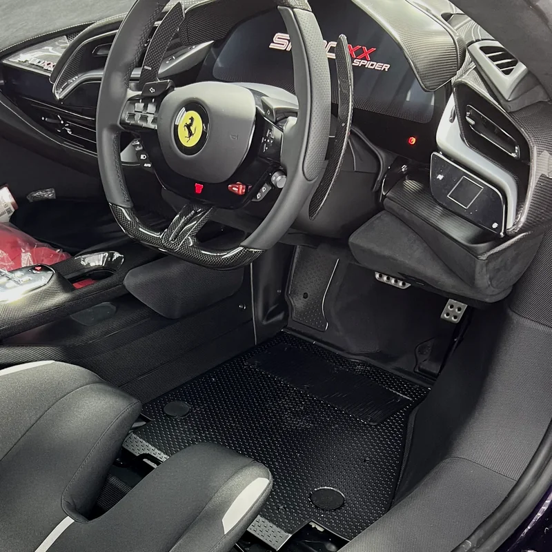 Ferrari cockpit with carbon steering wheel after interior detailing