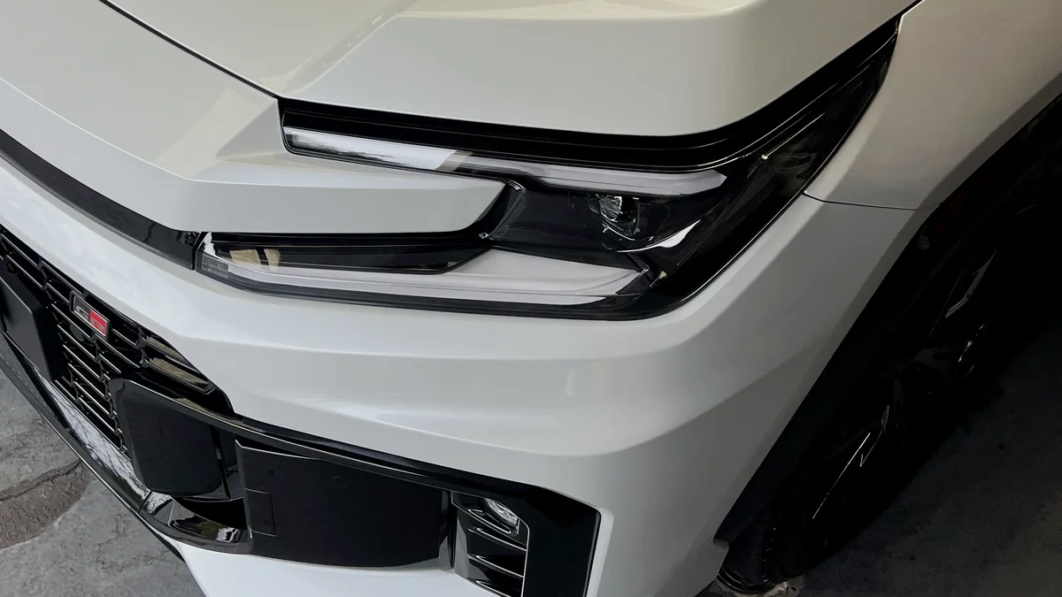 The front of a white Toyota RAV4 GR Sport after a Need for Studio ceramic coating